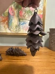 Rustic Cast Iron Garden Yard Art 6 Inch Pine Cone Shaped Wind Chime- 10 W/chain. Fixed Price $24.00.