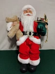 Musical Santa Rocking Chair Holding Teddy Bear From Collections Etc. Used. Fixed Price $22.99.
